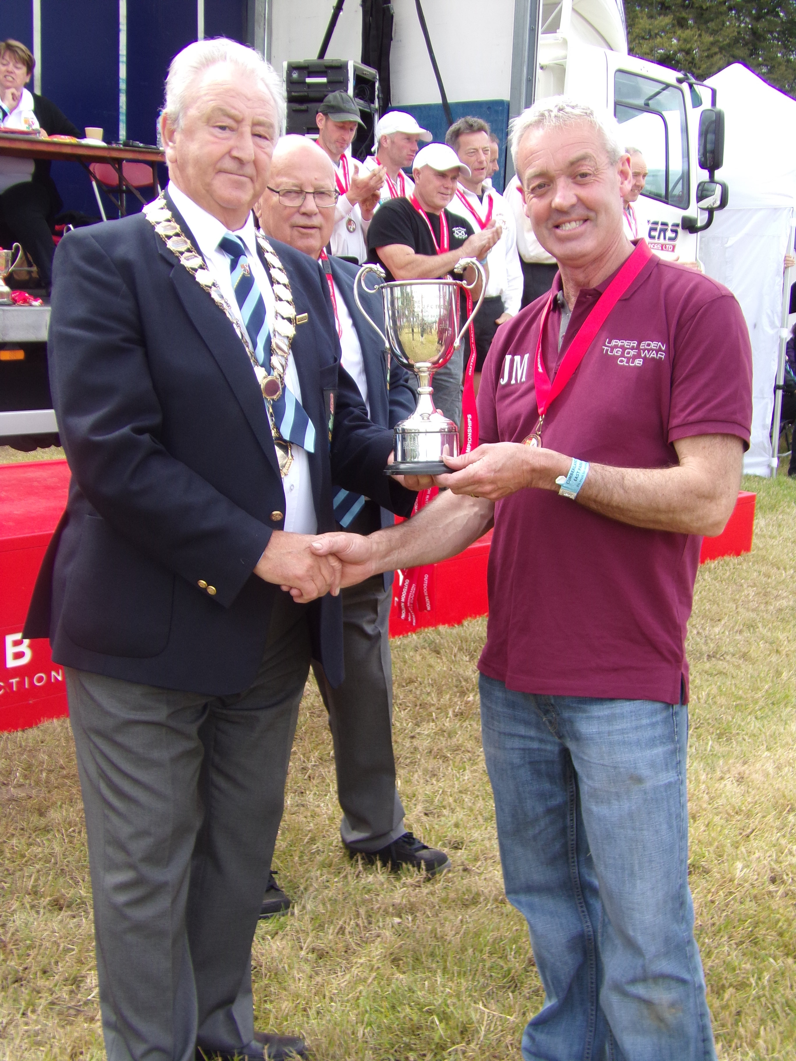 https://0501.nccdn.net/4_2/000/000/00f/745/Upper-Eden-Coach-James-Metcalfe-receiving-the-560kg-runner-up-trophy-2736x3648.jpg