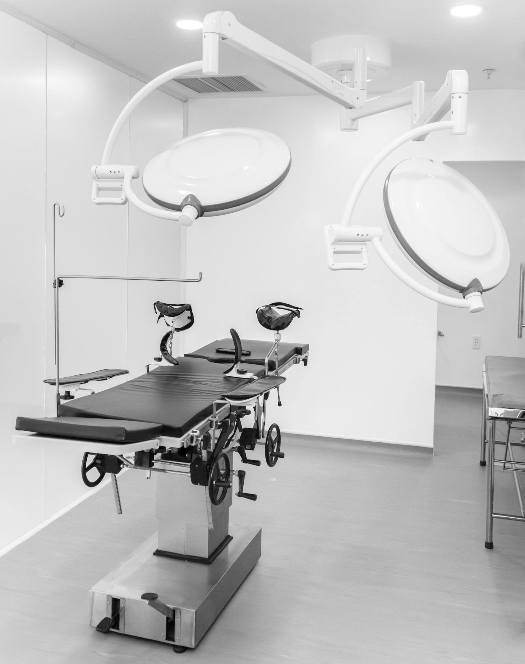 Modern eye clinic reception with doctors, patients, and advanced ophthalmology diagnostic equipment
