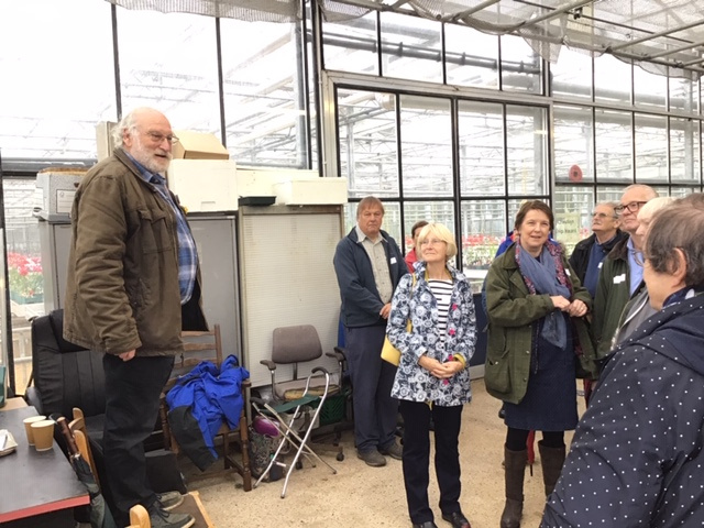 NAAS President de Rotheschild welcoming members and other visitors to his glasshouse.