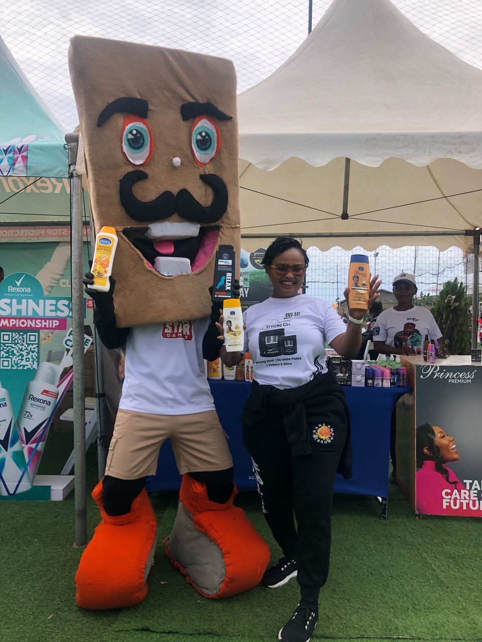 Cute cartoon animals, a fox, duck, and chipmunk, standing together outdoors with colorful hot air balloons in the sky.