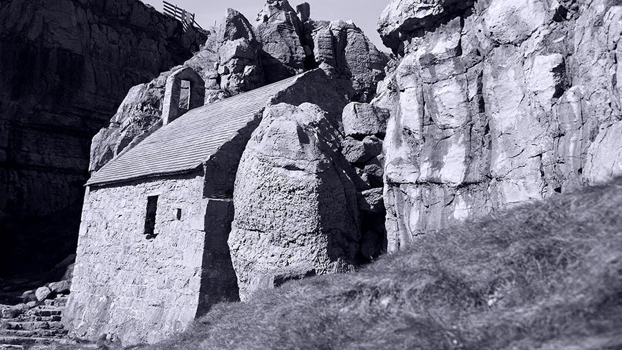 black and white photograph of St. Govan's Chapel Pembrokeshire by Mark Lloyd Williams
