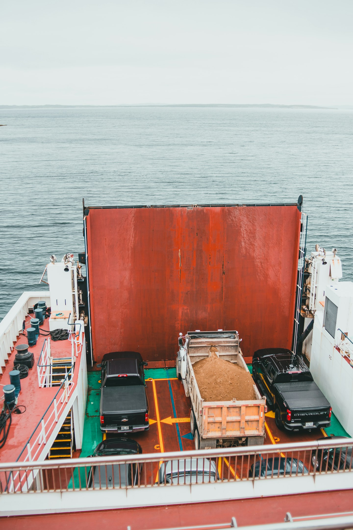 red and white boat on sea during daytime