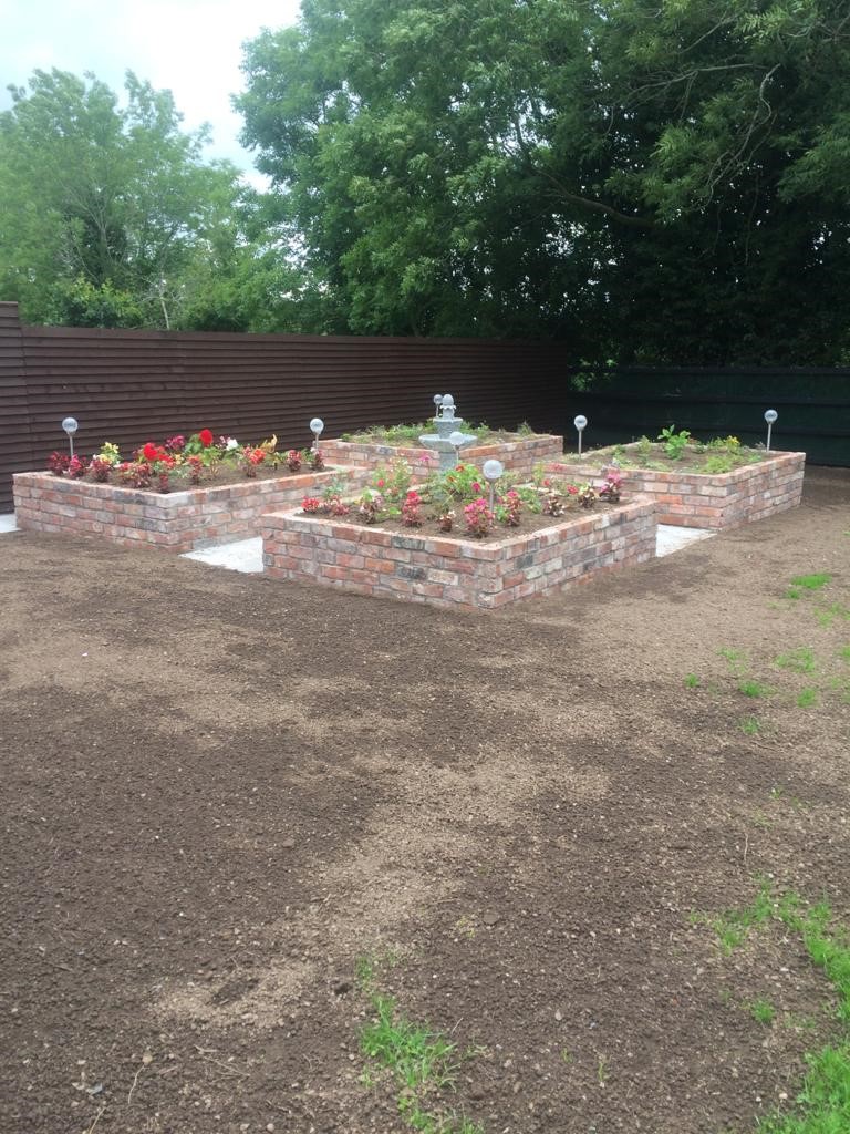 Reclaimed raised brick beds