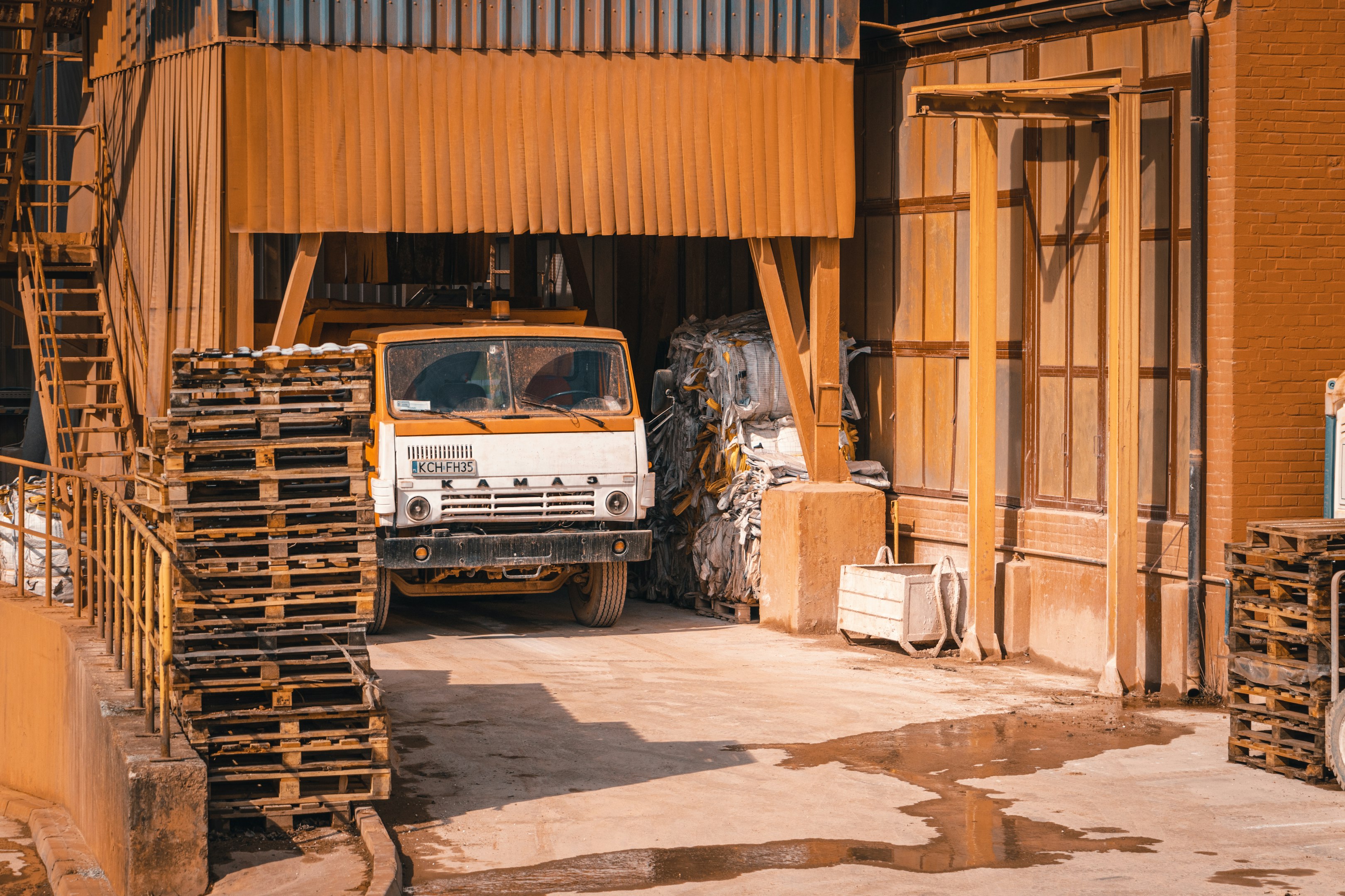 a truck is parked in front of a building