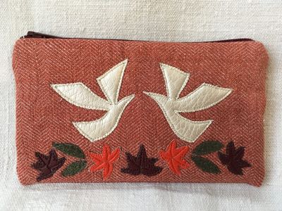 Pochette à bijoux aux colombes
