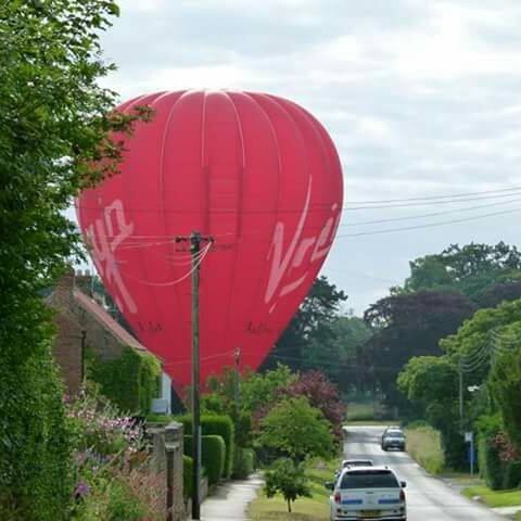 https://0501.nccdn.net/4_2/000/000/05e/0e7/Little-Ouseburn-Main-Street-with-balloon-480x480.jpg