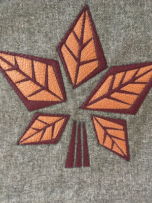 Feuille stylisée bordeaux et  orange