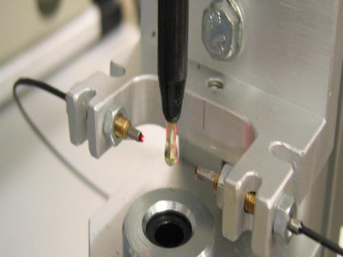 kontrola količine lepila z laserjem