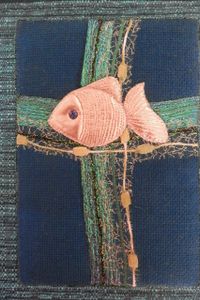 poisson chretien sur une couverture de bible