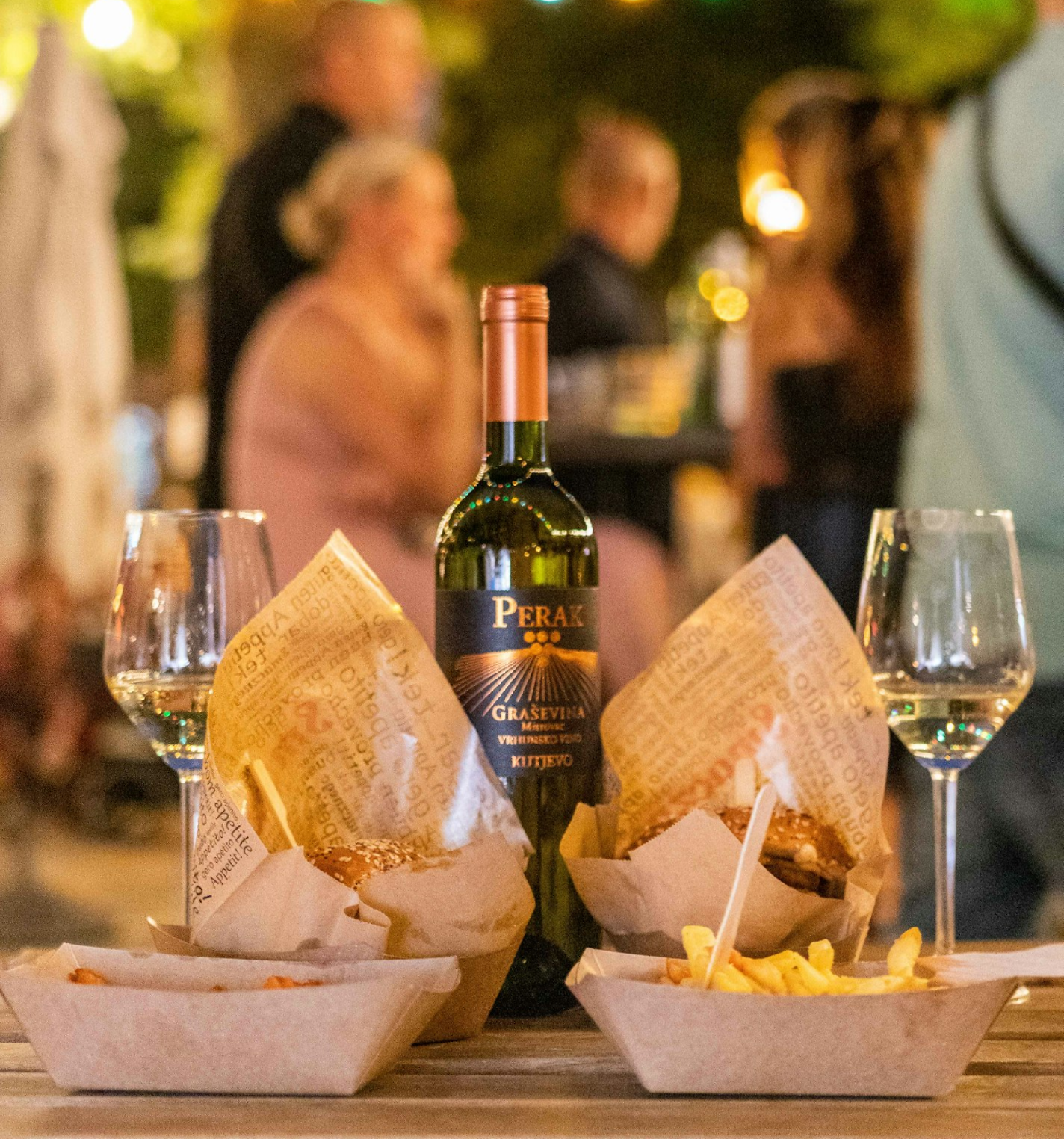 Vibrant can of Pebbles Bubbles surrounded by assorted fruits and colorful spheres against a dark background. Vibrant can of Pebbles Bubbles surrounded by assorted fruits and colorful spheres against a dark background.