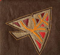 feuille très stylisée rouge et orange