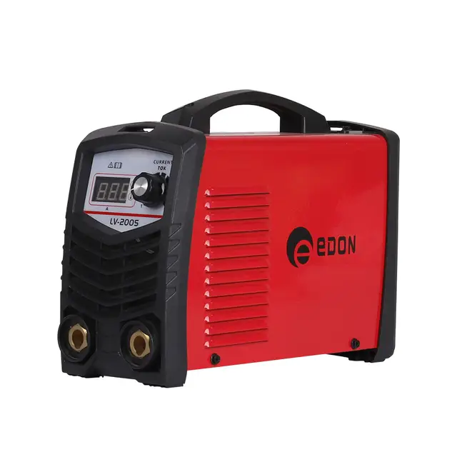 Worker in safety gear using a power tool with sparks in an industrial workshop.