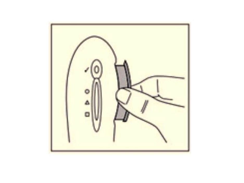 Potem, ko ste počakali natančno 15 minut, dvignite testno ploščico, jo pridržite horizontalno in povlecite ven modri drsnik.